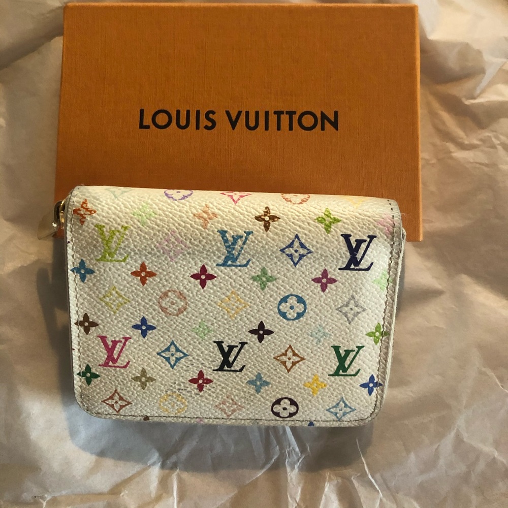 Multi color small zippy wallet with LV box